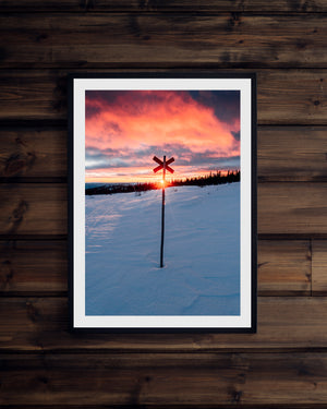 Solnedgång bakom ledkryss